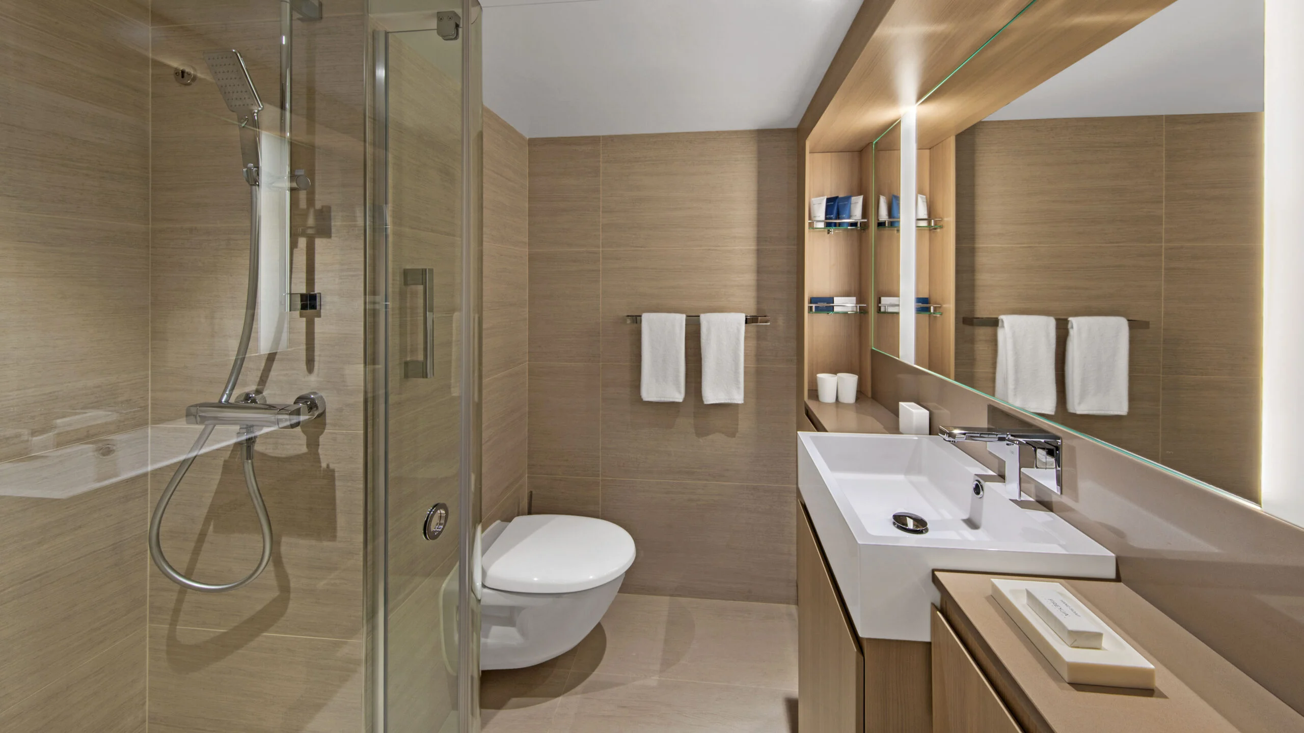 Viking ocean-fleet Deluxe Veranda representative bathroom, shown on the Vela accommodation page