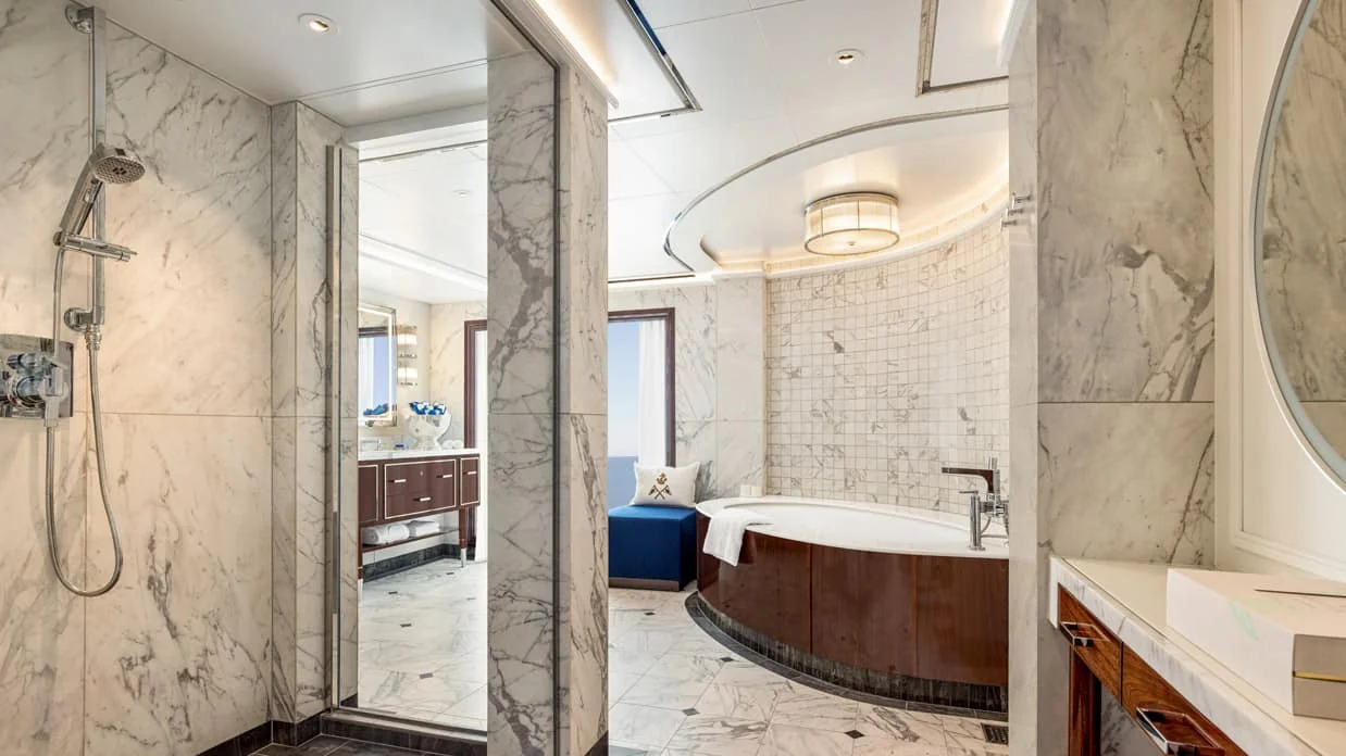 Representative Oceania Vista Owner's Suite bathroom with a bathtub and separate shower