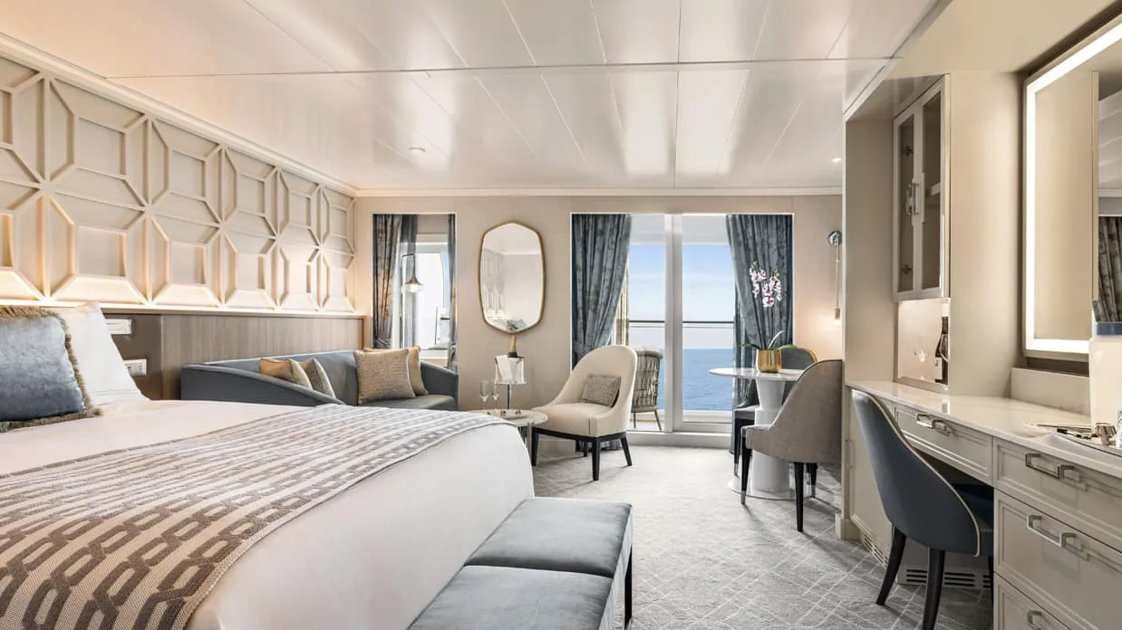 Representative Oceania Vista Penthouse Suite with bed and sitting area