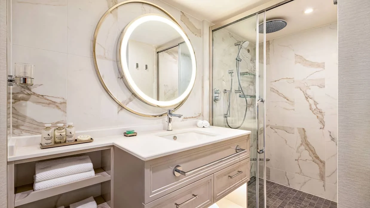 Representative Oceania Vista Veranda bathroom with a walk-in shower and vanity